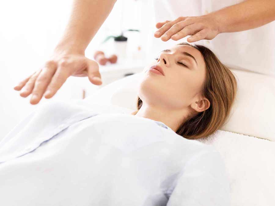 Reiki healing treatments available at Amore Aesthetics in Manchester